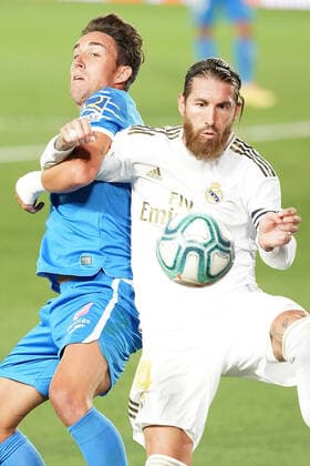 Real Madrid s Sergio Ramos (r) and Getafe CF s Jaime Mata during La Liga match. July 2,2020. (20200702400)