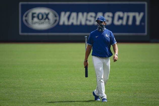 Kansas City Royals manager Mike Matheny wears a mask on the field at the start of Summer Camp training at Kaufman Stadium in Kansas City, Missouri on Friday, July 3, 2020. Major League Baseball is finally starting their 2020 season after the COVID-19 pandemic caused months of delays.  KCP20200703114 KYLExRIVAS