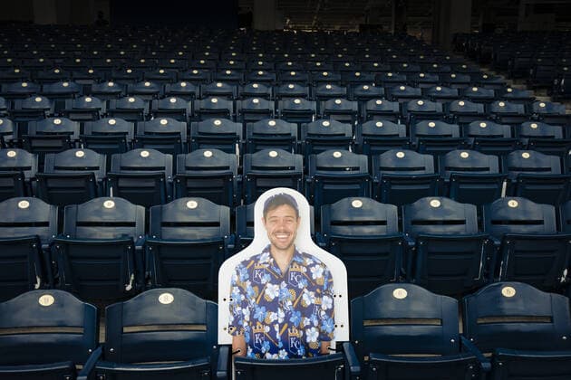 An example cutout of a fan is on display as Kansas City Royals take the field at the start of Summer Camp training at Kaufman Stadium in Kansas City, Missouri on Friday, July 3, 2020. Major League Baseball is finally starting their 2020 season after the COVID-19 pandemic caused months of delays.  KCP20200703120 KYLExRIVAS
