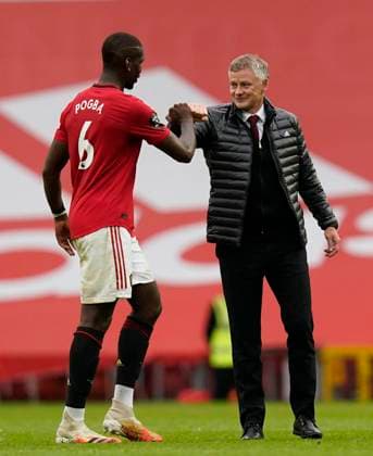 Paul Pogba of Manchester United, ManU congratulated by Ole Gunnar Solskjaer manager of Manchester United during the Premier League match at Old Trafford, Manchester. Picture date: 4th July 2020. Picture credit should read: Andrew Yates Sportimage EDITORIAL USE ONLY. No use with unauthorised audio, video, data, fixture lists, club league logos or live services. Online in-match use limited to 120 images, no video emulation. No use in betting, games or single club league player publications. SPI-0580-0095