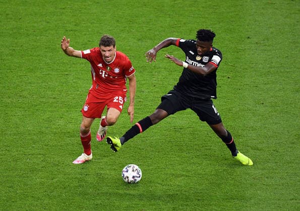 DFB Cup Final 2020 Bayer 04 Leverkusen Bayern Munich v l Thomas Mueller FC Bayern Munich , Edmond Tapsoba Bayer Leverkusen Football, Men, Season 2019 2020, 77 Final for the DFB Cup in Berlin, Bayer 04 Leverkusen FC Bayern Munich, 04 07 2020, Photo Matthias Koch POOL Berlin Olympiastadion Berlin Germany Poolfoto Matthias Koch POOL ,EDITORIAL USE ONLY