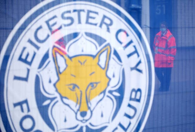 A steward patrols around the King Power Stadium whilst Leicester City play a football match against Crystal Palace behind closed doors on day one hundred and three of lockdown and Leicester has become the first local area to be placed back into lockdown, whilst most of the country has had a further relaxation of Coronavirus restrictions including being able to go to pubs, barbers and hairdressers. 