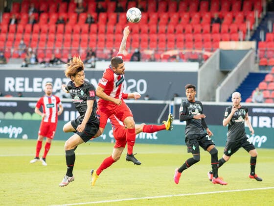 GER, FC Heidenheim vs Werder Bremen, football, Bundesliga Religation, 2019 2020, 06 07 2020 Marnon Busch FC Heidenheim, 02 , Yuya Osako SV Werder Bremen, 08 , alleged handball, video evidence, GER, FC Heidenheim vs Werder Bremen, Football, Bundesliga Religation, 2019 2020, 06 07 2020, DFB DFL regulations prohibit any use of photographs as image sequences and or quasi video , Foto EIBNER Sascha Walther Heidenheim Voith Arena Baden Wuerttemberg Germany Poolfoto Eibner Walther Pool ,EDITORIAL USE ONLY
