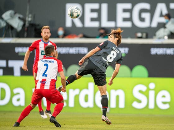 GER, FC Heidenheim vs Werder Bremen, Football, Bundesliga Religation, 2019 2020, 06 07 2020 Marnon Busch FC Heidenheim, 02 , Yuya Osako SV Werder Bremen, 08 , GER, FC Heidenheim vs Werder Bremen, Football, Bundesliga Religation, 2019 2020, 06 07 2020, DFB DFL regulations prohibit any use of photographs as image sequences and or quasi video , Foto EIBNER Sascha Walther Heidenheim Voith Arena Baden Wuerttemberg Germany Poolfoto Eibner Walther Pool ,EDITORIAL USE ONLY