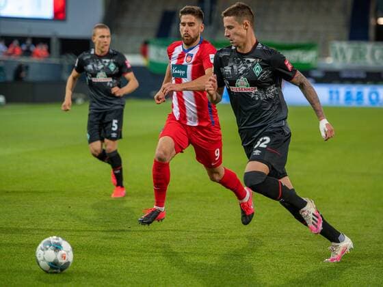 GER, FC Heidenheim vs Werder Bremen, Football, Bundesliga Religation, 2019 2020, 06 07 2020 Ludwig Augustinsson SV Werder Bremen 05 , Stefan Schimmer FC Heidenheim, 09 , Marco Friedl SV Werder Bremen 32 , GER, FC Heidenheim vs Werder Bremen, Football, Bundesliga Religation, 2019 2020, 06 07 2020, DFB DFL regulations prohibit any use of photographs as image sequences and or quasi video , Foto EIBNER Sascha Walther Heidenheim Voith Arena Baden Wuerttemberg Germany Poolfoto Eibner Walther Pool ,EDITORIAL USE ONLY
