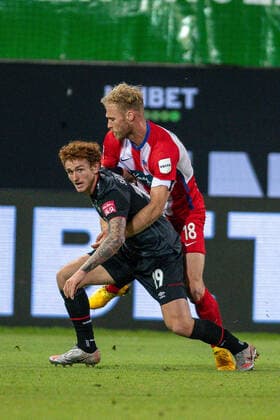 GER, FC Heidenheim vs Werder Bremen, Football, Bundesliga Religation, 2019 2020, 06 07 2020 Joshua Sargent SV Werder Bremen 19 , Sebastian Griesbeck FC Heidenheim, 18 , GER, FC Heidenheim vs Werder Bremen, Football, Bundesliga Religation, 2019 2020, 06 07 2020, DFB DFL regulations prohibit any use of photographs as image sequences and or quasi video , Foto EIBNER Sascha Walther Heidenheim Voith Arena Baden Wuerttemberg Germany Poolfoto Eibner Walther Pool ,EDITORIAL USE ONLY