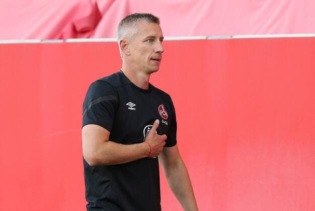11.07.2020 - Fussball - Saison 2019 2020 - Relegation - Rückspiel - 2. Fussball - Bundesliga 3. Liga - FC Ingolstadt 04 ( Schanzer ) - 1. FC Nürnberg FCN ( Club ) - Sportfoto Zink Daniel Marr - DFL DFB regulations prohibit any use of photographs as image sequences and or quasi-video - only for editorial use - Freude Jubel nach Spielende - Marek Mintal (Co-Trainer Interims-Co-Trainer 1. FC Nürnberg FCN ) atmet nach Spielende erleichtert durch und fasst sich an das Herz *** 11 07 2020 Football Season 2019 2020 Relegation return match 2 Football Bundesliga 3 League FC Ingolstadt 04 Schanzer 1 FC Nürnberg FCN Club Sportfoto Zink Daniel Marr DFL DFB regulations prohibit any use of photographs as image sequences and or quasi video only for editorial use Joy Jubilation after the end of the game Marek Mintal Co Trainer Interims Co Trainer 1 FC Nürnberg FCN breathes a sigh of relief after the end of the game and takes the heart