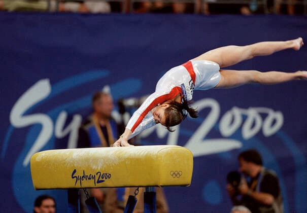 000919 Summer Olympics 2000, Artistic Gymnastics: Gold medalist Andrea Isarescu of Romania in vault during womens team all-around event at The Summer Olympic Games, Olympische Spiele, Olympia, OS on September 19, 2000 in Sydney, Australia. BILDBYRAN  Copyright: LENNARTxMANSSON BB000919LM054