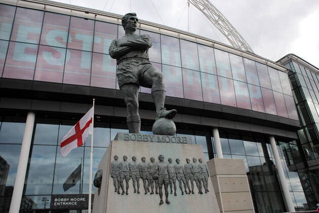 The Bobby Moore Statue on the concourse outside Wembley Stadium is very quiet before the Emirates FA Cup Semi-Final match Chelsea v Manchester United, ManU at Wembley Stadium, London, UK on July 19, 2020. The match is being played behind closed doors because of the current COVID-19 Coronavirus pandemic, and government social distancing lockdown restrictions. 