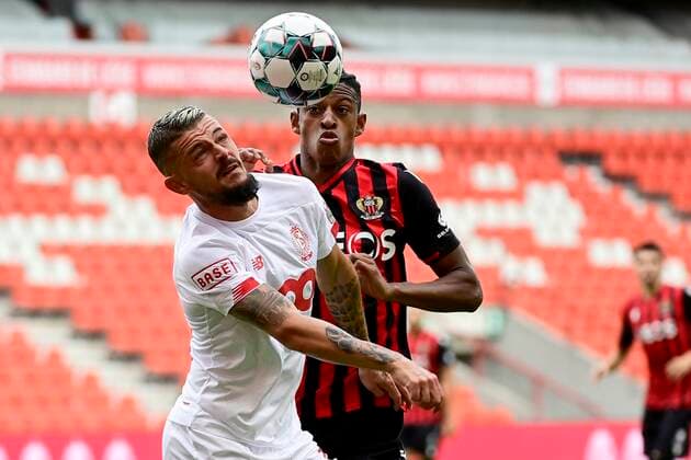 LIEGE, BELGIUM - JULY 25 : Maxime Lestienne midfielder of Standard Liege battles for the ball with Robson Bambu defender of Nice during a pre season friendly game between Standard de Liege and OGC Nice on July 25, 2020 in Liege, Belgium, 25 07 2020 ( Photo by Peter De Voecht Photonews FOOTBALL : Standard de Liege vs OGC Nice - 25 07 2020 PHOTONEWS PANORAMIC 