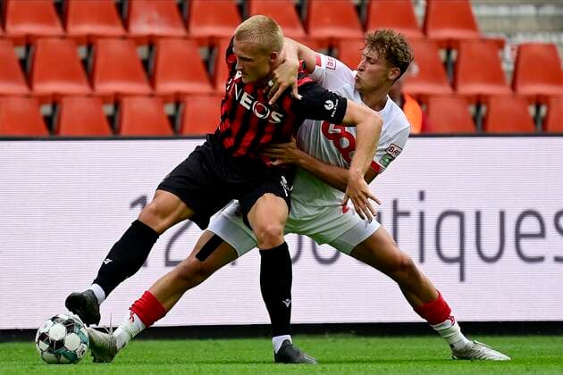 LIEGE, BELGIUM - JULY 25 : Mergim Vojvoda defender of Standard Liege battles for the ball with Kasper Dolberg forward of Nice during a pre season friendly game between Standard de Liege and OGC Nice on July 25, 2020 in Liege, Belgium, 25 07 2020 ( Photo by Peter De Voecht Photonews FOOTBALL : Standard de Liege vs OGC Nice - 25 07 2020 PHOTONEWS PANORAMIC 