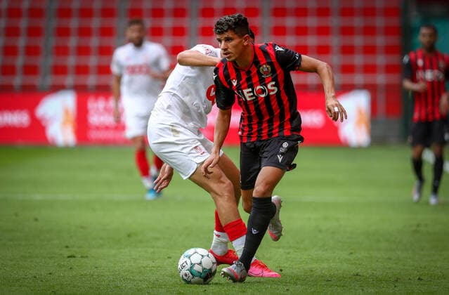 Standard s Selim Amallah and Nice s Youcef Atal fight for the ball during a friendly soccer game between Standard de Liege and OGC Nice, Saturday 25 July 2020 in Liege, in preparation of the upcoming 2020-2021 Jupiler Pro League season. VIRGINIExLEFOUR  x2521797x