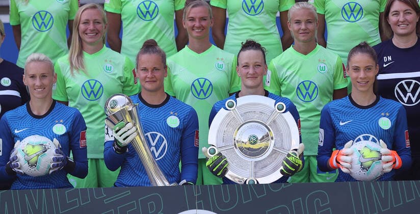 The goalkeepers of VfL Wolfsburg with DFB cup and championship cup by Katarzyna Kiedrzynek VfL Wolfsburg , Friederike Abt VfL Wolfsburg , Almuth Schult VfL Wolfsburg , Julia Kassen VfL Wolfsburg