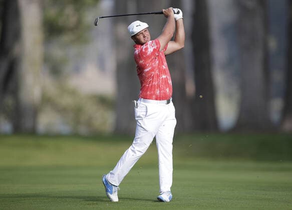 Bryson Dechambeau hits his approach shot to the 10th hole in the second round of the 102nd PGA, Golf Herren Championship at TPC Harding Park in San Francisco, California on Friday, August 7, 2020. The PGA Championship was originally scheduled to begin May 14 but was rescheduled to be played in August and without spectators due to ongoing coronavirus pandemic concerns.  SFP20200807104 JOHNxANGELILLO