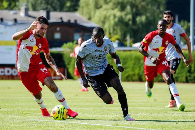 SOCCER - RBS vs Nice, test match ZELL AM SEE,AUSTRIA,08.AUG.20 - SOCCER - tipico Bundesliga, Ligue 1, Red Bull Salzburg vs OGC Nice, test match. Image shows Dominik Szoboszlai (RBS) and Stanley Nsoki (Nice). GEPAxpictures xJasminxWalter