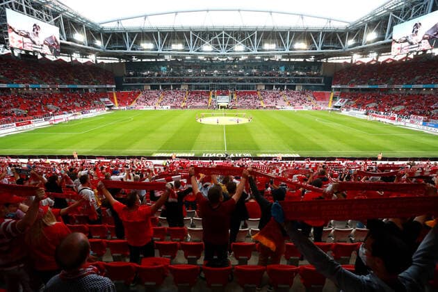 MOSCOW, RUSSIA - AUGUST 9, 2020: Spartak Moscow fans root for their team during a 2020 2021 Russian Premier League Round 1 football match against FC Sochi at Otkritie Arena. The game ended in a 2-2 draw. Sergei Fadeichev TASS  TS0E2C47