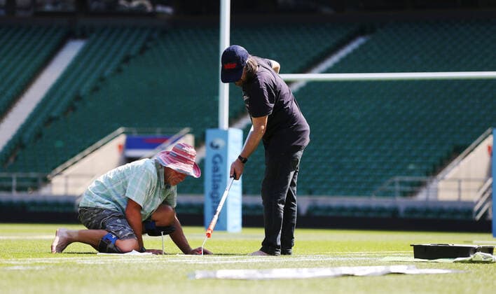 The pitch at Twickenham Stadium has been transformed into a stunning portrait featuring three of Premiership Rugby?s star players today (12th August 2020). The giant rugby art, the largest outdoor painting ever created in the UK, was unveiled to celebrate the restart of Gallagher Premiership Rugby on Friday 14 th August when Harlequins take on Sale Sharks at 7:45pm, just 200 metres away. The artwork features Harlequins player, Joe Marler; Saracens? Maro Itoje, as well as Sale Sharks? Rugby World Cup winner Faf de Klerk. It took team of eight artists more than 24 hours to complete the pitch portrait and more than 100 hours of planning before any paint touched the grass. A bespoke computer program was written to generate the precise measurements that were needed to create the artwork to the exact scale of the stadium. The image, which occupies most of the 7,000 square metre pitch, was created using a grid comprised of 13,420 elements. Each painted line in the portrait is just 6 inches wide. Nearly 1280 litres of biodegradable pitch marker paint were used for the elaborate creation. An estimated 150,000 passengers will enjoy the spectacle from the sky this week on flights in and out of London?s Heathrow airport. Faf de Klerk was one of the featured Premiership Rugby stars in the portrait. The Sale Sharks star said, I didn t realise it was going to be on the field, I thought it was going to be a photo up somewhere or on the big screen. It s looking really cool. There are a lot of great players in the Premiership, and it is amazing. I feel really privileged and quite humble . Speaking about the impact of lockdown on the Saracens star Maro Itoje said The last few months have been really tough on fans and players but we?re back and we?re ready for the start of the season on Friday 14th August. The past five months has shown us how important the sport is and what it brings to people lives. British artist John Lundberg, who oversaw the po Copyright: xScottxGarfitt PinPep CoverxImagesx 0103040129st EDITORIAL USE ONLY. RESTRICTED TO NEWSPAPERS BASED IN THE UK