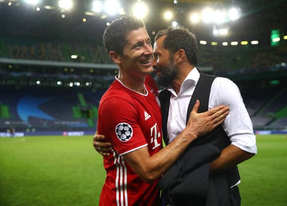 FOOTBALL Bayern Munich vs Olympique Lyonnais 1 2 Phase final UEFA Champions League Final 8 Lisbonne 19 08 2020 LISBON, PORTUGAL AUGUST 19 Robert Lewandowski of Bayern Munich is embraced following their victory in the UEFA Champions League Semi Final match between Olympique Lyonnais and Bayern Munich at Estadio Jose Alvalade on August 19, 2020 in Lisbon, Portugal Lisbonne Portugal Poolfoto Panoramic POOL UEFA ,EDITORIAL USE ONLY