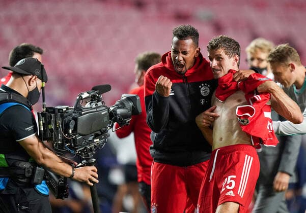 Final Football UEFA Champions League FC BAYERN MUENCHEN PARIS ST GERMAIN PSG Lisbon, Lisbon, Portugal, 23rd August 2020 final celebration Jerome Boateng Munich , Thomas Mueller Munich in TV camera in the final match UEFA Champions League, final tournament FC BAYERN MUENCHEN PARIS ST GERMAIN PSG in season 2019 2020, FCB, photographer Peter Schatz Pool UEFA REGULATIONS PROHIBIT ANY USE OF PHOTOGRAPHS as IMAGE SEQUENCES and or QUASI VIDEO National and international News Agencies OUT Editorial Use ONLY Lisbon Estadio da Luz de Benfica Portugal Poolfoto Peter Schatz Pool ,EDITORIAL USE ONLY