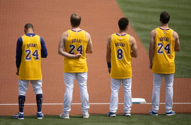 August 23, 2020, Los Angeles, California, USA: The Los Angeles Dodgers players and coaches wear Kobe Bryant s (24) and (8) game shirt during a memorial ceremony prior to their game against the Colorado Rockies on Sunday August 23, 2020 at Dodger Stadium in Los Angeles, California. Mookie Betts 50 (L) bows his head during the remembrance video. JAVIER ROJAS PI Los Angeles USA - ZUMAp124 20200823_zaa_p124_064 Copyright: xJavierxRojasx