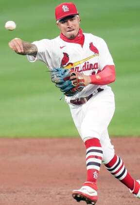 St. Louis Cardinals Kolten Wong throws the baseball to first base to get Kansas City Royals Nicky Lopez in the second inning at Busch Stadium in St. Louis on Tuesday, August 25, 2020.  SLP2020082522 BILLxGREENBLATT