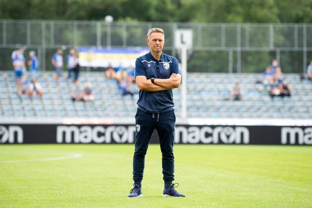Regionalliga Nordost 3 Matchday Season 2020 2021 29 8 2020 FC Carl Zeiss Jena vs 1 FC Lok Leipzig Coach Dirk Kunert Jena stands with crossed arms on the field Ernst Abbe Sportfeld