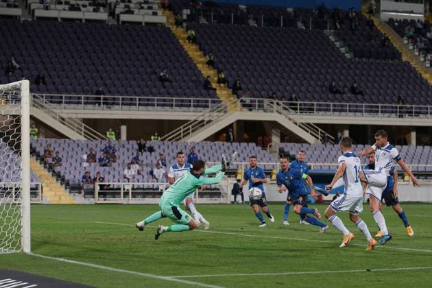 Edin Dzeko of Bosnia and Herzegovina fires the ball past Gianluigi Donnarumma of Italy to give the side a 1-0 lead during the UEFA Nations League match at Stadio Artemio Franchi, Florence. Picture date: 4th September 2020. Picture credit should read: Jonathan Moscrop Sportimage EDITORIAL USE ONLY. No use with unauthorised audio, video, data, fixture lists, club league logos or live services. Online in-match use limited to 120 images, no video emulation. No use in betting, games or single club league player publications. SPI-0644-0008