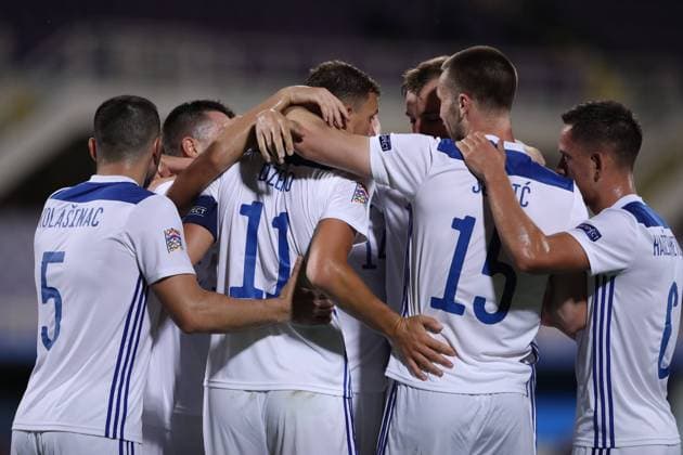 Fußball, Nations League, Italien - Bosnien-Herzegowina Edin Dzeko of Bosnia and Herzegovina celebrates with team mates after scoring to give the side a 1-0 lead during the UEFA Nations League match at Stadio Artemio Franchi, Florence. Picture date: 4th September 2020. Picture credit should read: Jonathan Moscrop Sportimage EDITORIAL USE ONLY. No use with unauthorised audio, video, data, fixture lists, club league logos or live services. Online in-match use limited to 120 images, no video emulation. No use in betting, games or single club league player publications. SPI-0644-0012