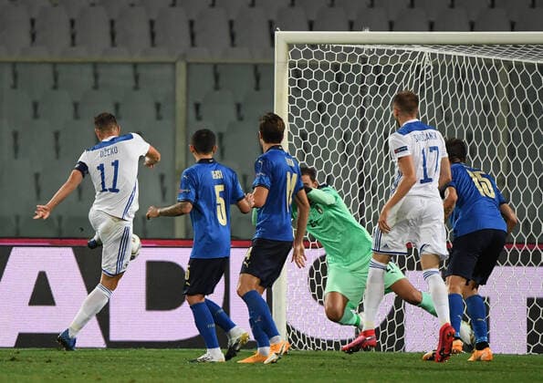 (200905) -- FLORENCE, Sept. 5, 2020 -- Bosnia and Herzegovina s Edin Dzeko (1st L) scores his goal during a UEFA Nations League match between Italy and Bosnia and Herzegovina in Florence, Italy, Sept. 4, 2020. (SP)ITALY-FLORENCE-FOOTBALL-UEFA NATIONS LEAGUE-ITA VS BIH ChengxTingting 