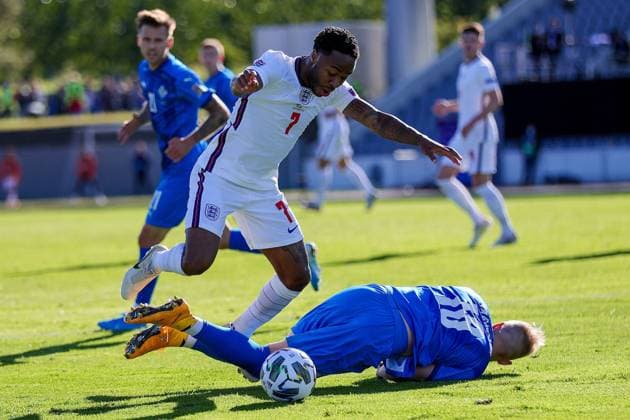 Iceland v England UEFA Nations League 05 09 2020. England midfielder Raheem Sterling (7) is tackled by Iceland defender Hordur Magnusson (18) during the UEFA Nations League match between Iceland and England at Laugardalsvollur, Reykjavik, Iceland on 5 September 2020. Editorial use only , Copyright: xNigelxKeenex PSI-10412-0016