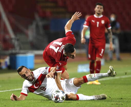 (200907) -- BELGRADE, Sept. 7, 2020 -- Turkey s Kenan Karaman (bottom) vies with Serbia s Filip Kostic during the UEFA Nations League football match between Serbia and Turkey at the Rajko Mitic stadium in Belgrade, Serbia, Sept. 6, 2020. The match ended in a 0-0 draw. (Photo by Predrag Milosavljevic Xinhua) (SP)SERBIA-BELGRADE-FOOTBALL-UEFA NATIONS LEAGUE-LEAGUE B-GROUP 3-SERBIA VS TURKEY ShixZhongyu 