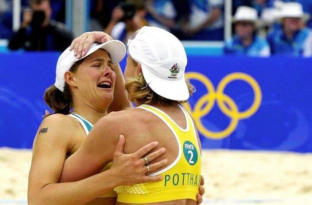 POTTHARST COOK, Sydney, September 25, 2002. File - Australian beach volleyballers Natalie Cook (left) and partner Kerri Pottharst hug after winning a hard fought Olympic final against Brazil Septebmer 25, 2000. Cook and partner Kerri Pottharst won gold 12-11, 12-10 at the Beach volleyball, Beachvolleyball Centre, Bondi. ( NO ARCHIVING, EDITORIAL USE ONLY, NO USE IN BOOKS WITHOUT CONSENT SYDNEY AUS  Copyright: xDEANxLEWINSx 0104103060st