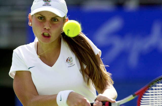 WOMENS TENNIS, 20th September, 2000. Sydney Olympic Games, Olympische Spiele, Olympia, OS Womens Tennis, Singles First Round. Australia s Jelena Dokic in action against Japan s Ai Sugiyama on Centre Court. (AAP PHOTO Dean Lewins). NO ARCHIVING, EDITORIAL USE ONLY, NO USE IN BOOKS WITHOUT CONSENT SYD AUS  Copyright: xDEANxLEWINSx 0104103281st