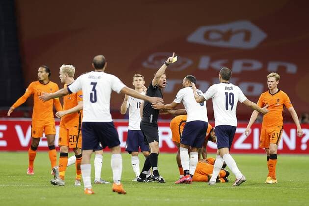 AMSTERDAM, 07-09-2020, JohanCruyff Stadium, season 2020 2021 . Nations Leaque game between Netherlands and Italy. Referee Friedrich Brych and Italian player Danilo D Ambrosio Netherlands - Italy  x9133139x Copyright: