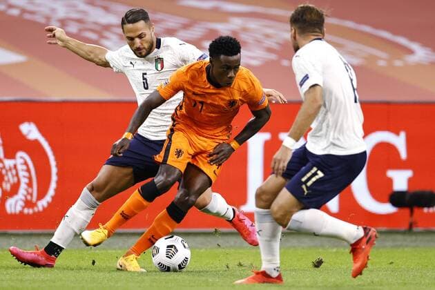 (L to R) Danilo D Ambrosio of Italy, Quincy Promes of Holland, Ciro Immobile of Italy during the UEFA Nations League A group 1 qualifying match between the Netherlands and Italy at the Johan Cruyff Arena on September 07, 2020 in Amsterdam, The Netherlands . ANP MAURICE VAN STEEN xVIxANPxSportx xxANPxIVx 422454239