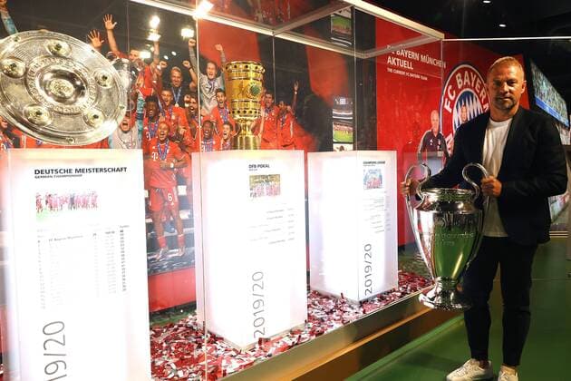 ATTENTION POOLFOTO getty Hassenstein exhibition area inauguratedHansi Flick presents the triple in the FC Bayern Museum Hans Dieter Flick Hansi ,Coach Bayern Muenchen carries the Champions League Cup into the world of experience in the Allianz Arena on 09 09 2020 Photo Alexander Hassenstein Getty Images via Sven Simon Fotoagentur GmbH Co Exhibition area inauguratedHansi Flick presents the triple at the FC Bayern Museum 775558757