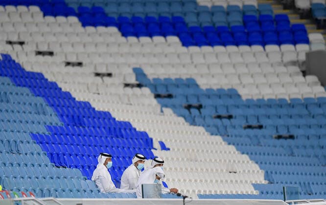 (200916) -- BEIJING, Sept. 16, 2020 -- Local organizing officers watch the AFC Asian Champions League group B football match between Shabab Al Ahli of United Arab Emirates and Shahr Khodrou of Iran at Al Janoub Stadium in Doha, Capital of Qatar, Sept. 14, 2020. Shabab Al Ahli won 1-0. (Photo by Nikku Xinhua) XINHUA PHOTOS OF THE DAY yangyuanyong 