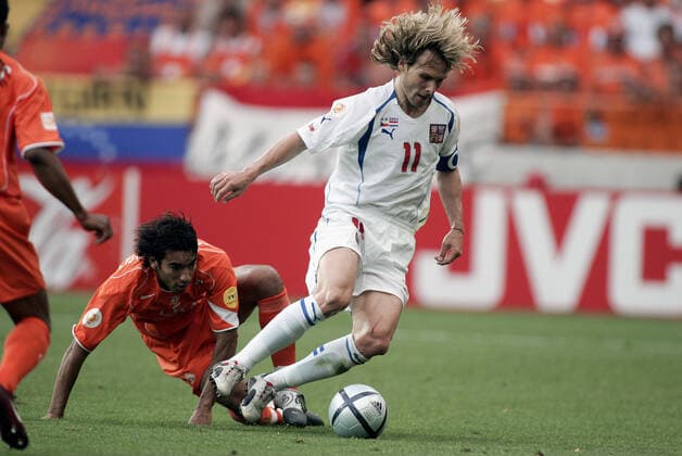 Giovanni Van Bronckhorst & Pavel Nedved Holland V Czech Republic Holland V Czech Republic Municipal Stadium, Aveiro, Portugal 19 June 2004  Copyright: Allstar RichardxSelle 12831077