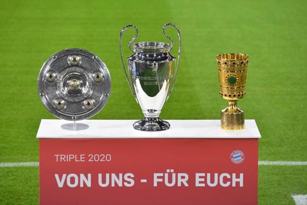The Triple Cup, Championship Cup, Champions League Cup and DFB Cup will be presented Cup, Cup, Trophaee, factual record of Football 1 Bundesliga Season 2020 2021,1 Matchday, Matchday01, FC Bayern Muenchen M FCSchalke 04 GE 8 0, on 18 09 2020 in Munich A L L I A N Z A R E N A, DFL REGULATIONS PROHIBIT ANY USE OF PHOTOGRAPHS AS IMAGE SEQUENCES AND OR QUASI VIDEO EDITORIAL USE ONLY