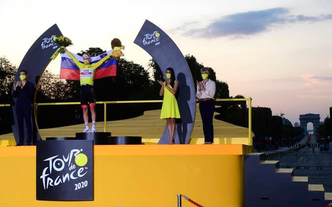 PARIS, FRANCE - SEPTEMBER 20 : POGACAR Tadej (SLO) of UAE TEAM EMIRATES pictured with the yellow jersey during the podium ceremony during stage 21 of the 107th edition of the 2020 Tour de France cycling race, a stage of 122 kms with start in Mantes-la-Jolie and finish at the Avenue des Champs Elysees in Paris on September 20, 2020 in Paris, France, 20 09 2020 CYCLISME : Tour de France - Etape 21 - Mantes la Jolie a Paris Champs Elysees - 20 09 2020 PhotoNews Panoramic 