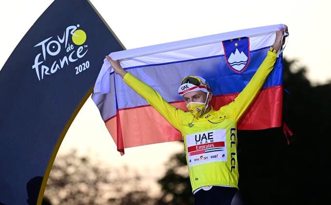 PARIS, FRANCE - SEPTEMBER 20 : POGACAR Tadej (SLO) of UAE TEAM EMIRATES pictured with the yellow jersey during the podium ceremony during stage 21 of the 107th edition of the 2020 Tour de France cycling race, a stage of 122 kms with start in Mantes-la-Jolie and finish at the Avenue des Champs Elysees in Paris on September 20, 2020 in Paris, France, 20 09 2020 CYCLISME : Tour de France - Etape 21 - Mantes la Jolie a Paris Champs Elysees - 20 09 2020 PhotoNews Panoramic 