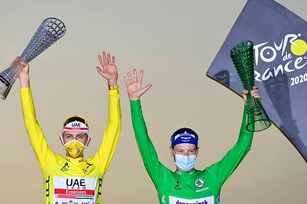 PARIS, FRANCE - SEPTEMBER 20 : POGACAR Tadej (SLO) of UAE TEAM EMIRATES & BENNETT Sam of Deceuninck - Quick Step pictured during the podium ceremony during stage 21 of the 107th edition of the 2020 Tour de France cycling race, a stage of 122 kms with start in Mantes-la-Jolie and finish at the Avenue des Champs Elysees in Paris on September 20, 2020 in Paris, France, 20 09 2020 CYCLISME : Tour de France - Etape 21 - Mantes la Jolie a Paris Champs Elysees - 20 09 2020 PhotoNews Panoramic 