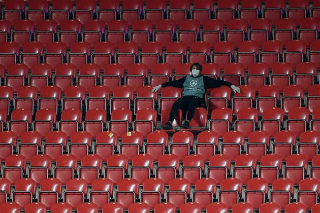 Fan sits at the empty tribune during the fourth qualifying round of the Champions League match Slavia Praha vs Midtjylland in Prague, Czech Republic, September 22, 2020. (CTKxPhoto OndrejxDeml) CTKPhotoP202009221113101 DML 06