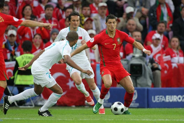 Mehmet Aurelio, Tuncay Sanli & Cristiano Ronaldo Portugal V Turkey Portugal V Turkey,Euro 2008 Stade De Geneve, Geneve, Switzerland 07 June 2008 Copyright: Allstar RichardxSelle 12891228
