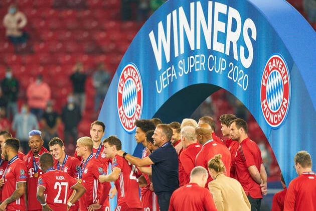 Budapest, Hungary, 24th September 2020. Celebration with trophy Trainer Hansi FLICK (FCB), team manager, headcoach, coach, Thomas MUELLER, MÜLLER, FCB 25 in the Final UEFA Supercup match FC BAYERN MUENCHEN - FC SEVILLA 2-1 in Season 2019 2020, FCB, Munich,