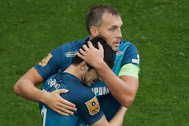 ST PETERSBURG, RUSSIA - SEPTEMBER 26, 2020: FC Zenit St Petersburg s Sardar Azmoun (L) and Artyom Dzyuba celebrate scoring in the 2020 2021 Russian Premier League Round 9 football match against FC Ufa at Gazprom Arena Stadium. Alexander Demianchuk TASS  TS0E88BB