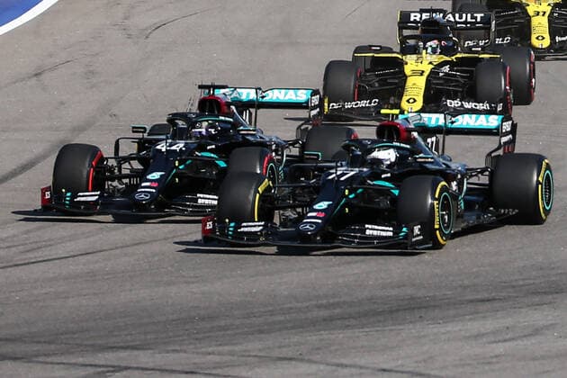 SOCHI, RUSSIA - SEPTEMBER 27, 2020: Mercedes-AMG Petronas F1 team drivers Lewis Hamilton of the United Kingdom (L) and Valtteri Bottas of Finland compete in the 2020 Formula One Russian Grand Prix at the Sochi Autodrom racing circuit. Dmitry Feoktistov TASS  TS0E89E0