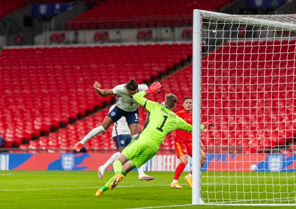 (201009) -- LONDON, Oct. 9, 2020 () -- England s Dominic Calvert-Lewin (front L) scores the first goal with a header during a friendly match between England and Wales in London, Britain, on Oct. 8, 2020. () (SP) BRITAIN-LONDON-FOOTBALL-FRIENDLY MATCH-ENGLAND VS WALES Xinhua 