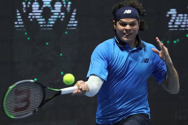 ST PETERSBURG, RUSSIA - OCTOBER 13, 2020: Canadian tennis player Milos Raonic struggles in a Round of 32 match against his American rival Jeffrey John Wolf during the St Petersburg Open 2020 international tournament held at Sibur Arena. Alexander Demianchuk TASS  TS0EAB1A
