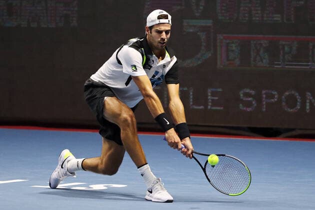 ST PETERSBURG, RUSSIA - OCTOBER 13, 2020: Russian tennis player Karen Khachanov struggles in a Round of 32 match against his Australian rival James Duckworth during the St Petersburg Open 2020 international tournament held at Sibur Arena. Alexander Demianchuk TASS  TS0EAB5D